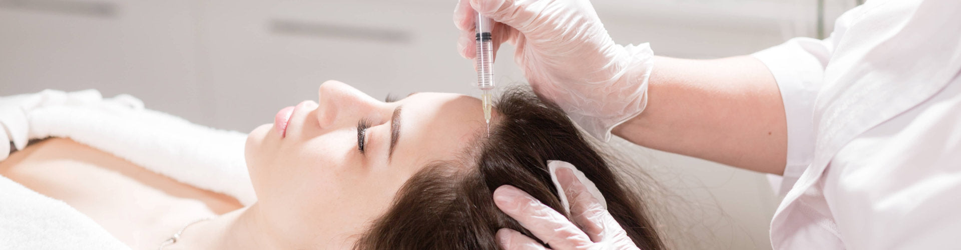 woman getting her scalp treatment